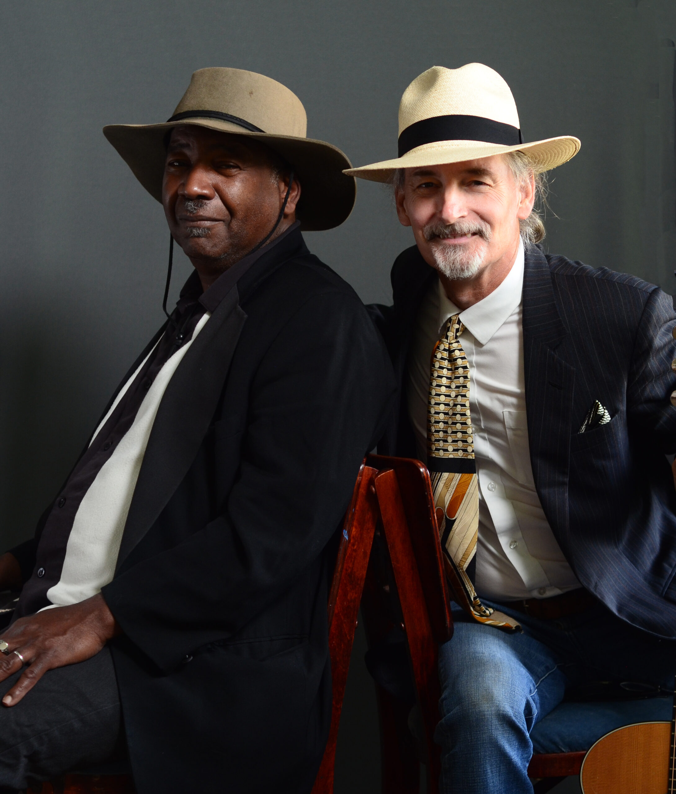 J&J smiles and playing Portrait by John Dorchester